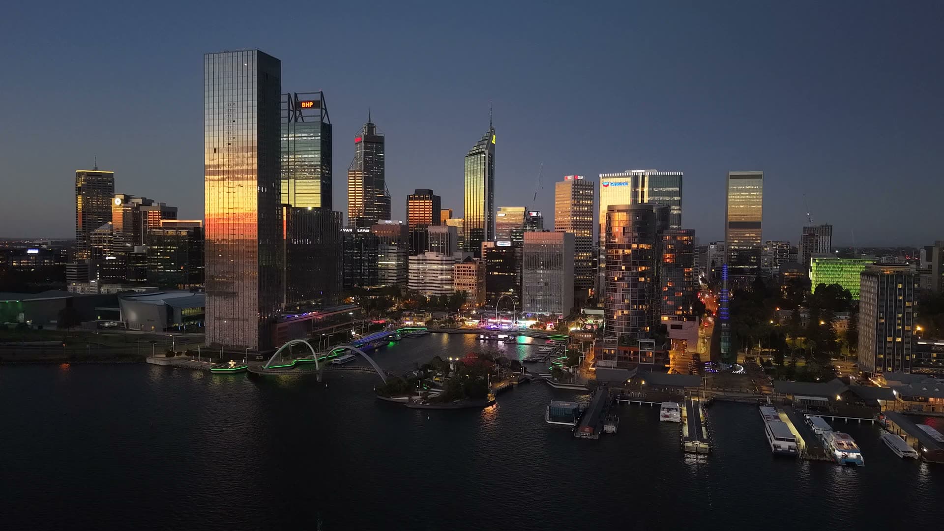 The Perth skyline across the Swan River at dusk